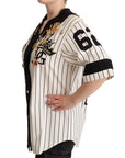 Dolce & Gabbana Elegant Striped V-Neck Blouse with Charms