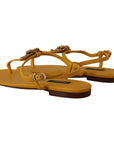 Dolce & Gabbana Mustard T-Strap Flat Sandals with Heart Embellishment