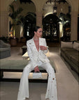 Designer Fashion Women's White Pantsuit - Hollow Rivet Eyelet Blazer and Flare Pants Set