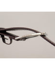 Dolce & Gabbana Elegant Maroon Leather Belt with Engraved Buckle