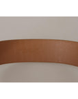 Dolce & Gabbana Elegant Beige Leather Belt with Engraved Buckle