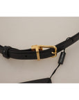 Dolce & Gabbana Elegant Black Leather Belt with Engraved Buckle