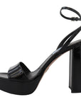 Prada Elevate Your Elegance with Glossy Black Heels