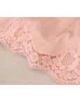 Dolce & Gabbana Elegant Sheer Lace Sleeveless Blouse in Pink