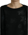 Dolce & Gabbana Elegant Black Floral Applique Sweater