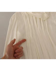 Dolce & Gabbana Off White Silk Long Sleeve Turtle Neck Top