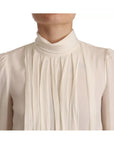 Dolce & Gabbana Off White Silk Long Sleeve Turtle Neck Top