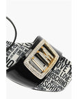 Moschino LOVE Patent Leather Flat Sandals with Logoed Jewel Detail