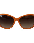 Dolce & Gabbana Chic Orange Round Sunglasses for Women