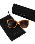 Dolce & Gabbana Chic Orange Round Sunglasses for Women