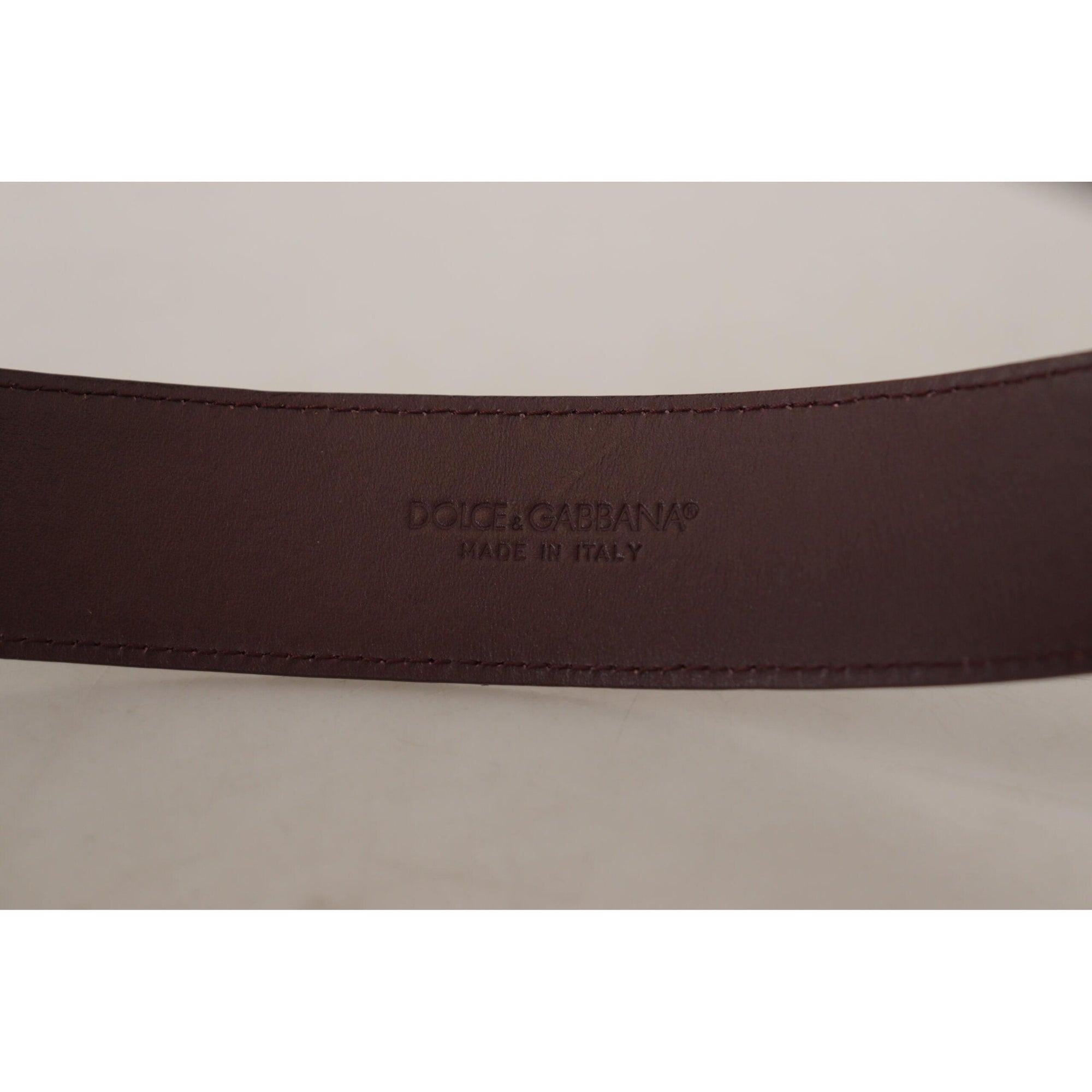 Dolce &amp; Gabbana Elegant Maroon Leather Belt with Engraved Buckle