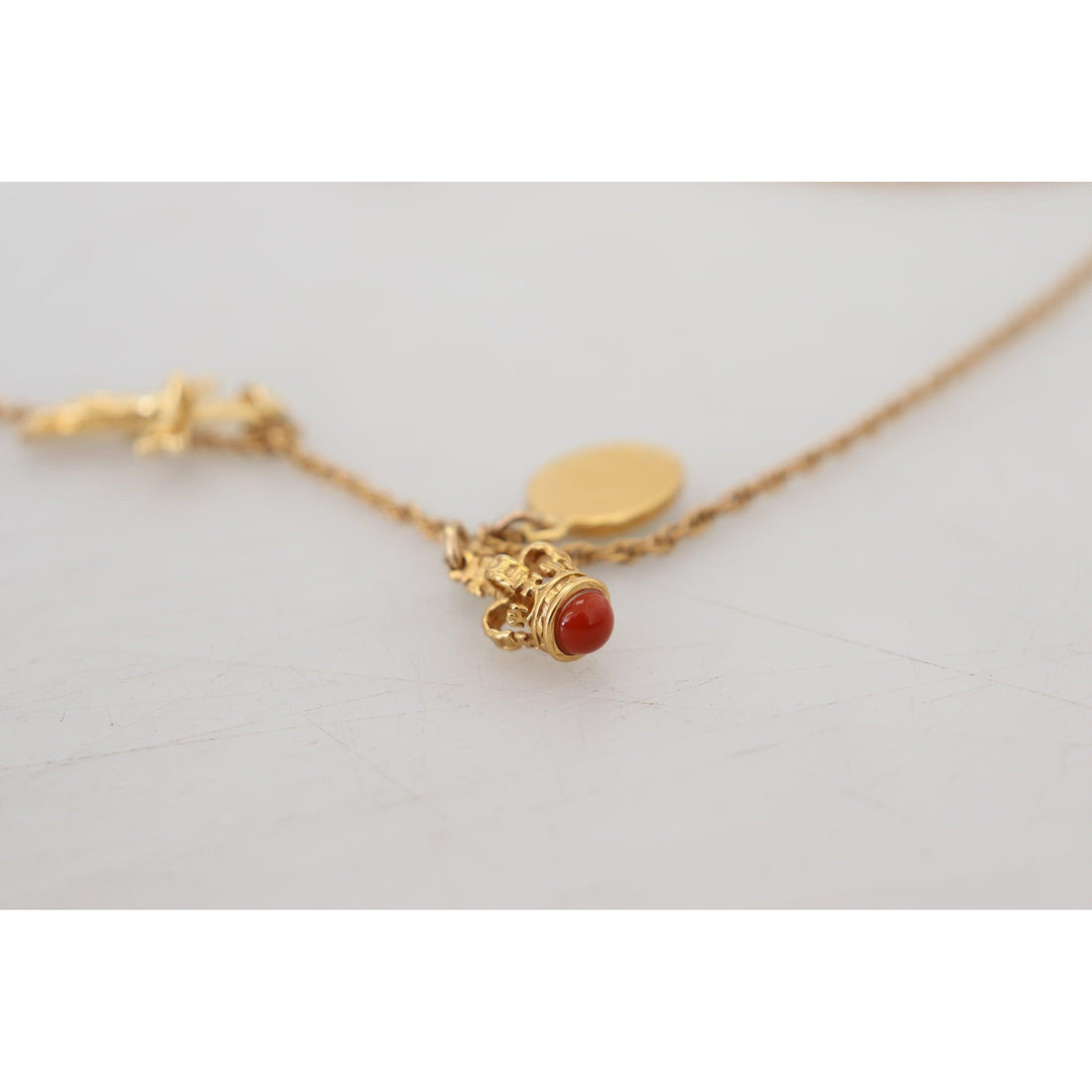 Dolce & Gabbana Elegant Gold Tone Charm Necklace with Cross Pendant