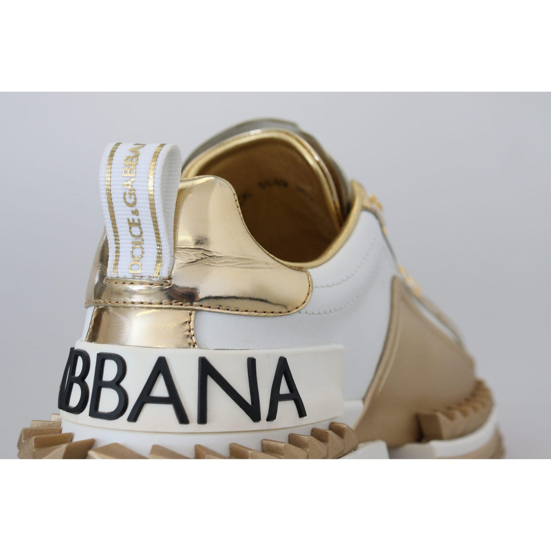 Dolce & Gabbana Elegant White and Gold Leather Sneakers